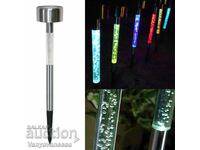 Solar lamp with changing colors, imitating bubbles