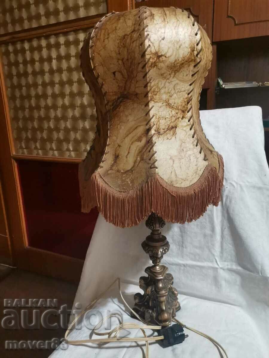 Old night lamp. Animal leather