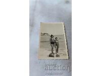 Photo St. Constantine Boy and girl on a stone on the shore 1939