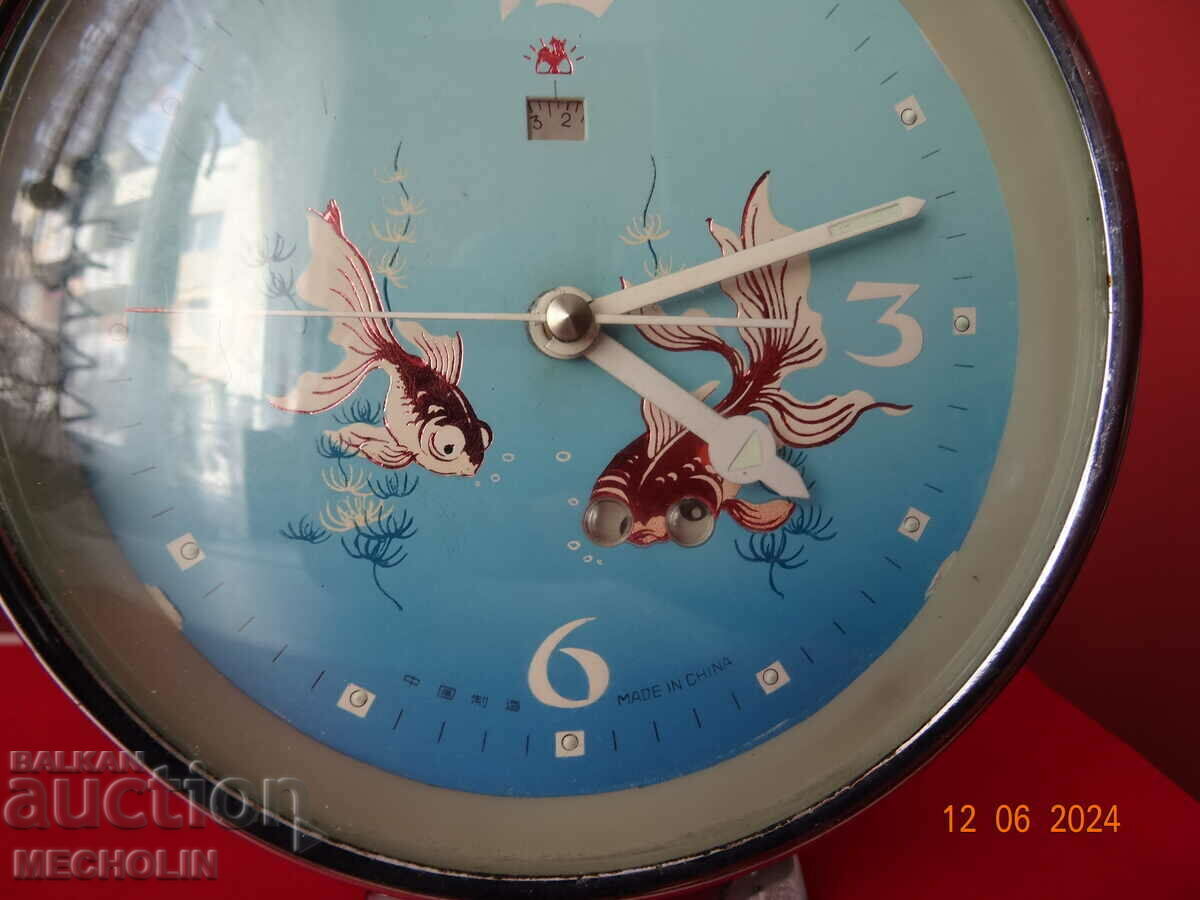 Delivery of COLLECTIBLE CHINESE ALARM CLOCK 2D FISH 5 Delivery of COLLECTIBLE CHINESE ALARM CLOCK 2D FISH 5