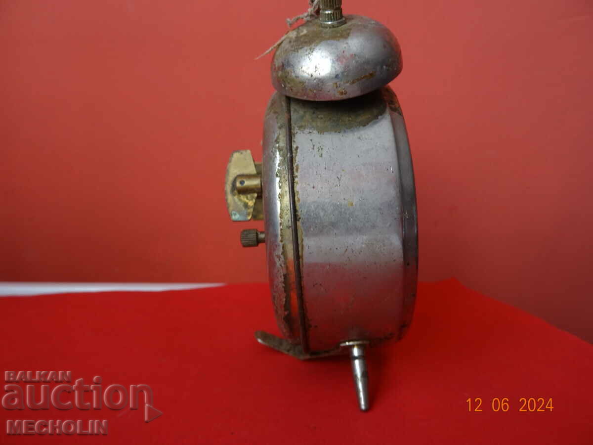 Delivery of COLLECTIBLE CHINESE ALARM CLOCK WITH BELLS Delivery of COLLECTIBLE CHINESE ALARM CLOCK WITH BELLS