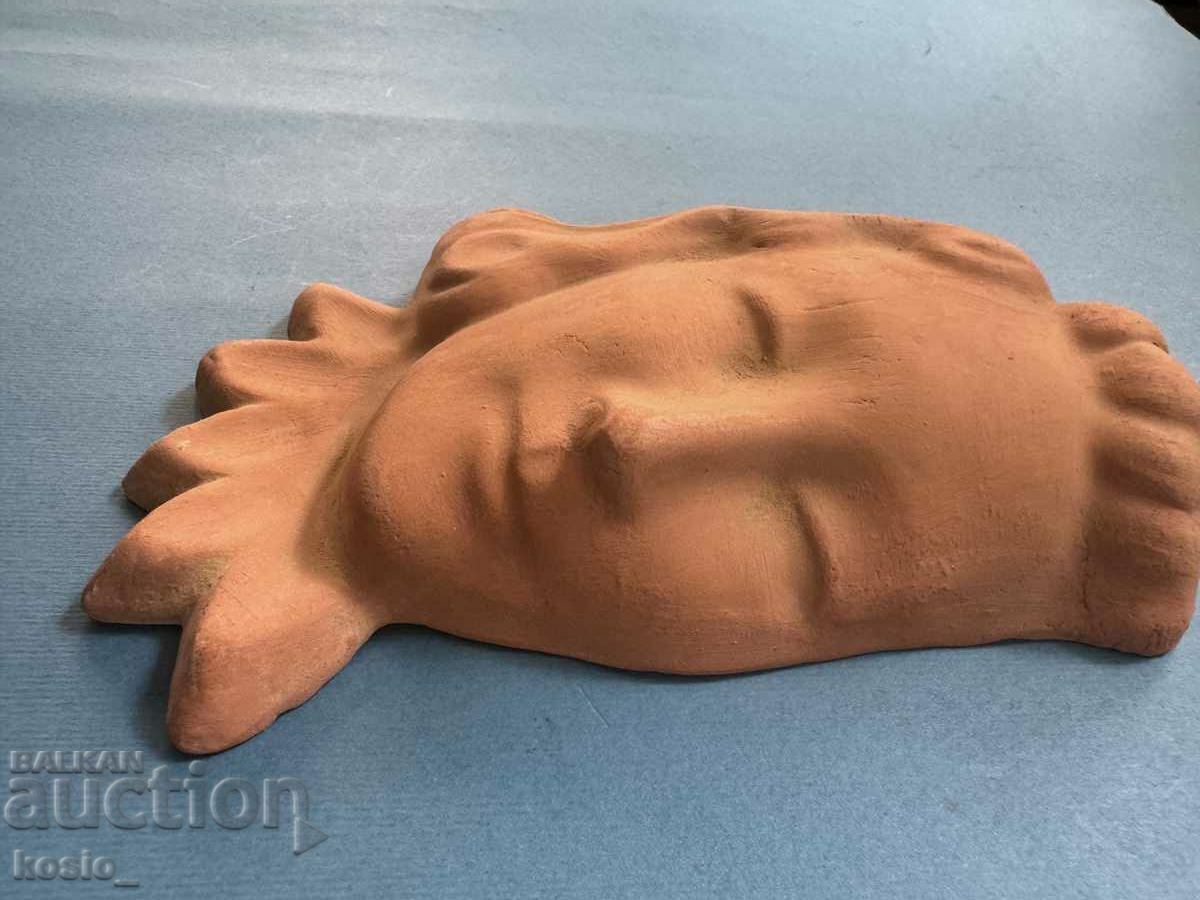 Delivery of Ceramic wall mask from around 1930