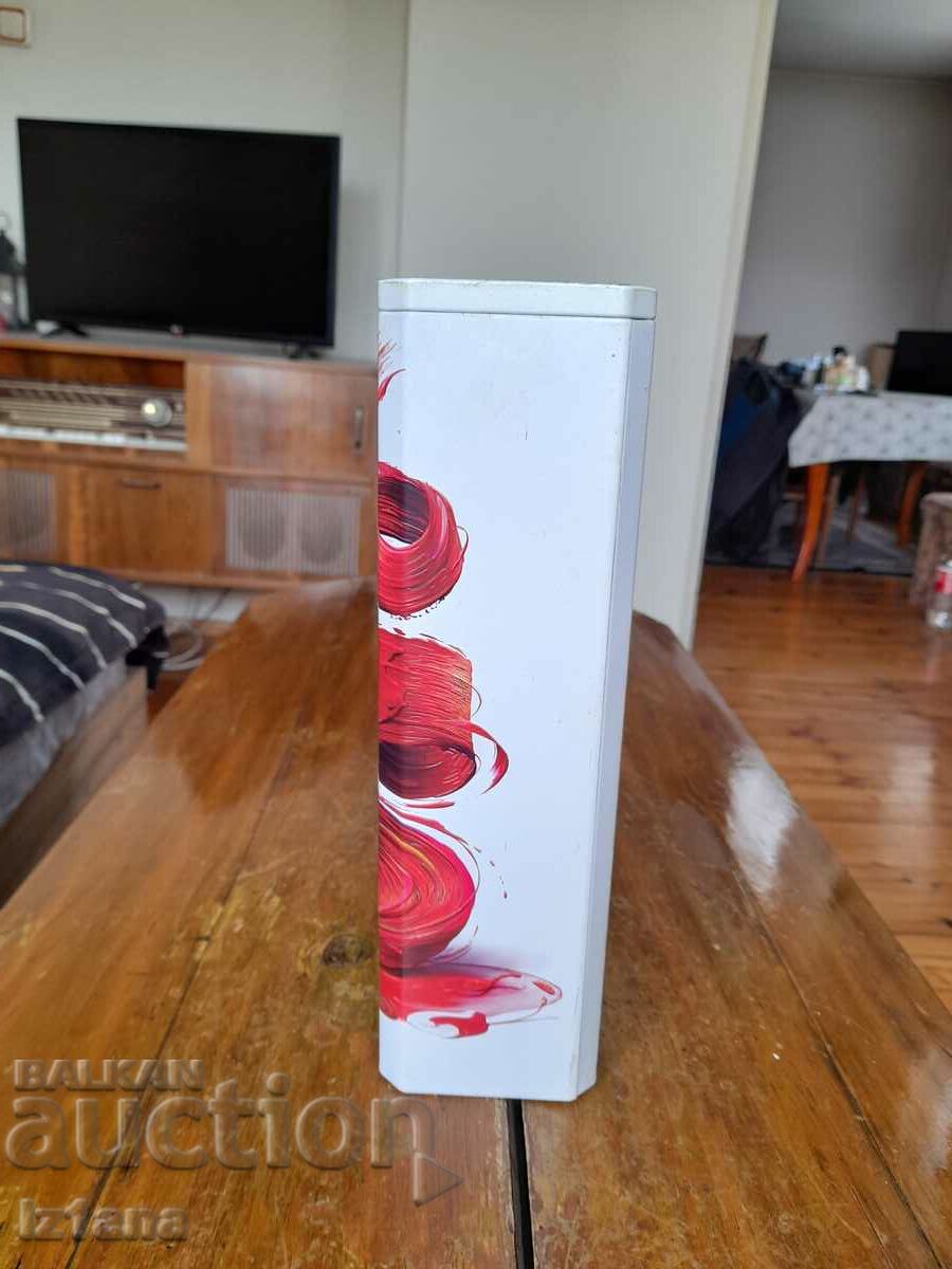 Delivery of An old Johnnie Walker can