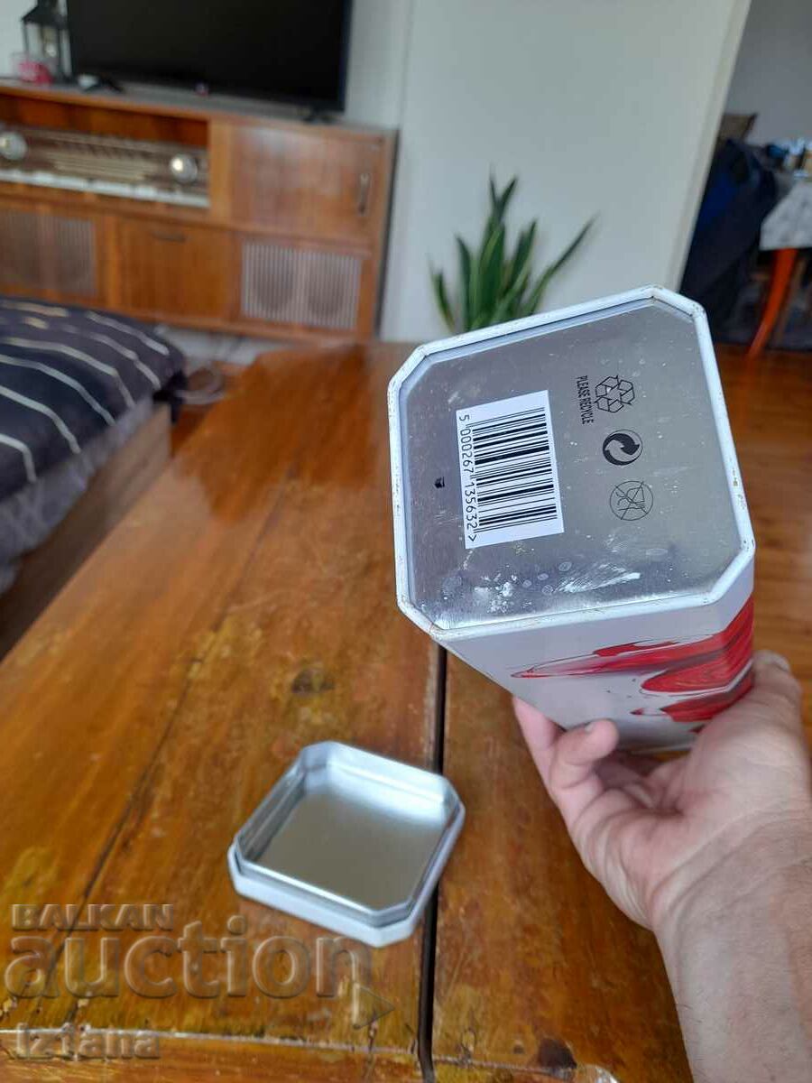 An old Johnnie Walker can - 7