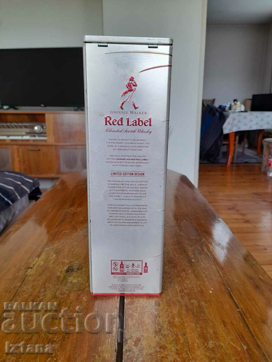 Auction An old Johnnie Walker can Auction An old Johnnie Walker can