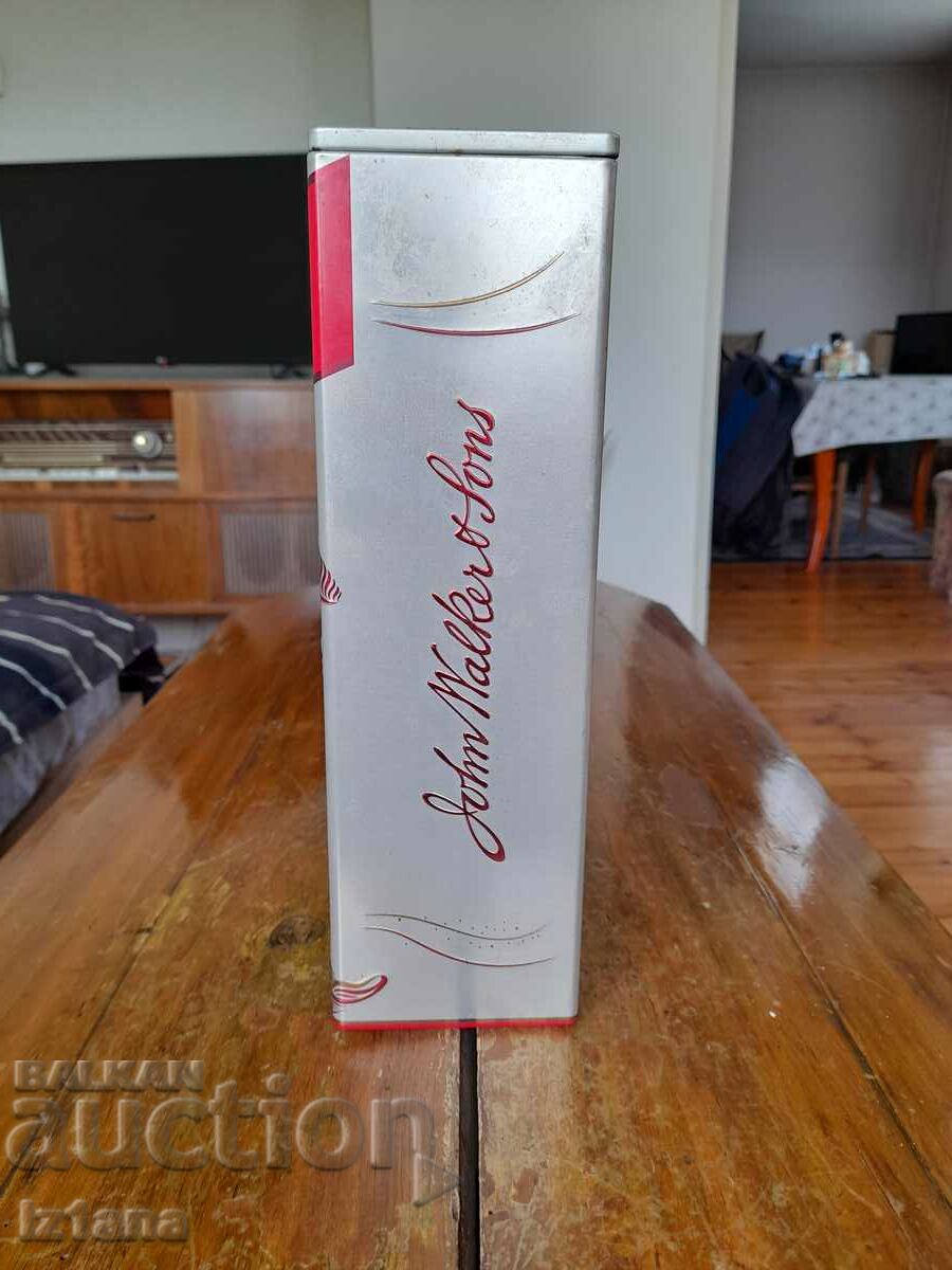 Delivery of An old Johnnie Walker can Delivery of An old Johnnie Walker can