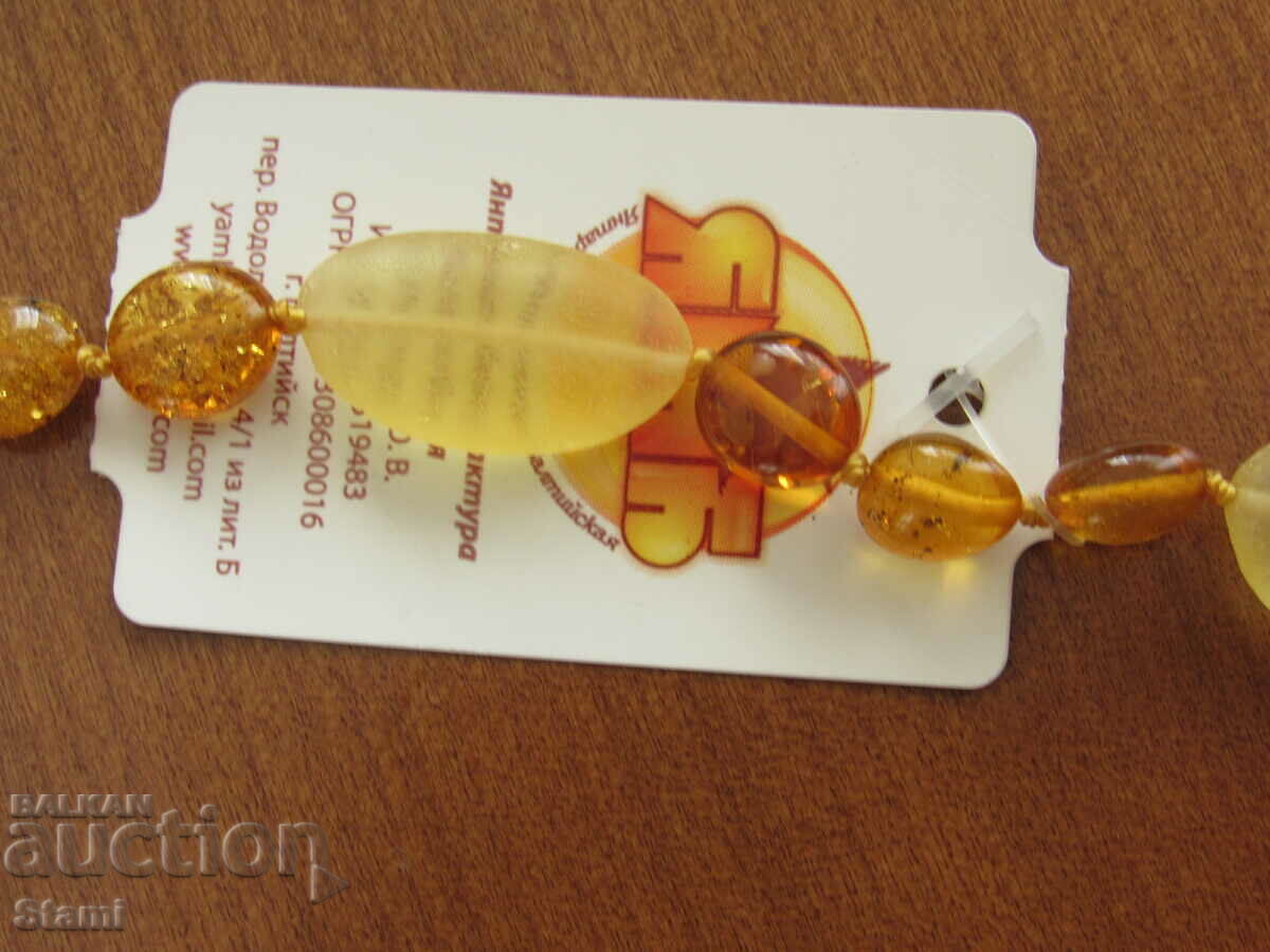 Delivery of Women's circle necklace made of premium Baltic amber Delivery of Women's circle necklace made of premium Baltic amber