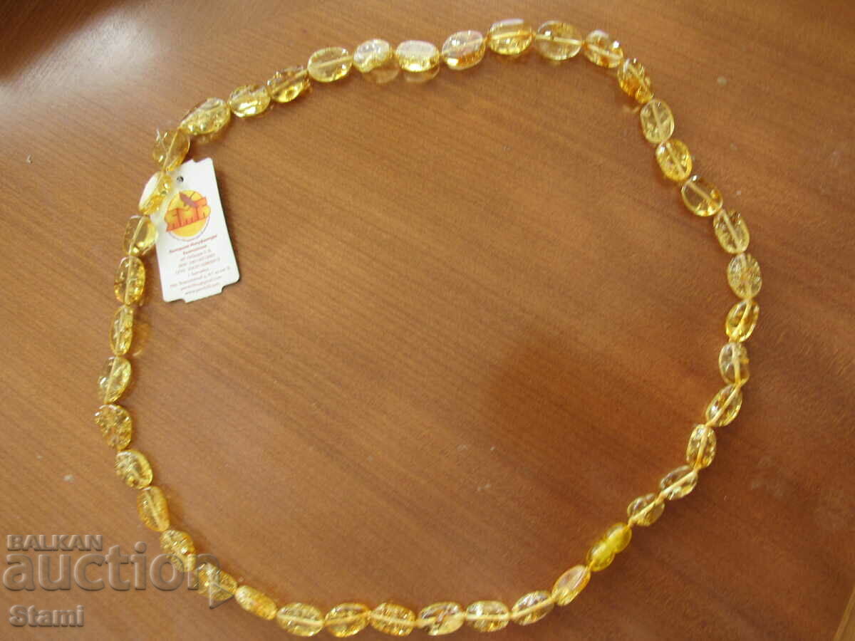 Colier cerc pentru femei din chihlimbar baltic premium cu preț 148.00 BGN | € 75.67 Colier cerc pentru femei din chihlimbar baltic premium cu preț 148.00 BGN | € 75.67