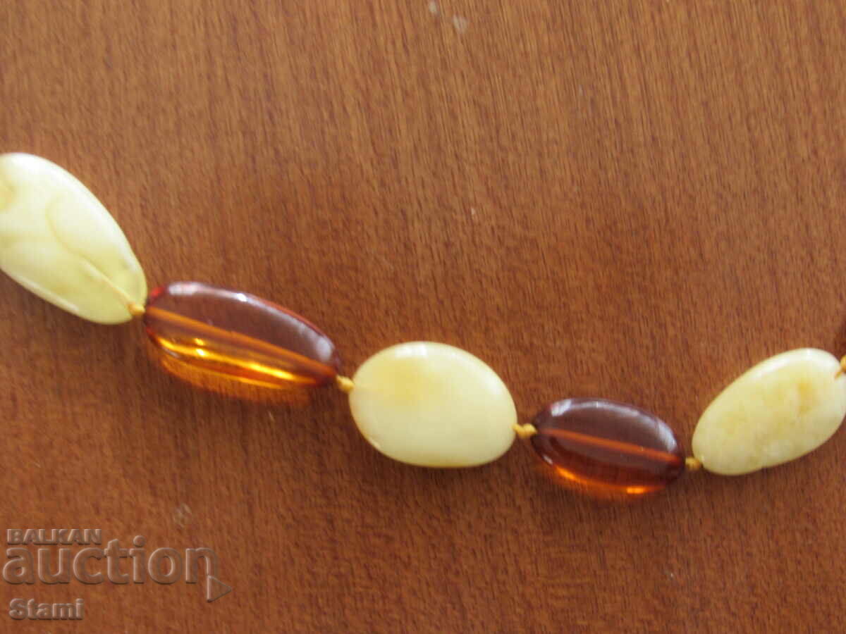 Women's circle necklace made of premium Baltic amber with price 76.00 BGN | € 38.86