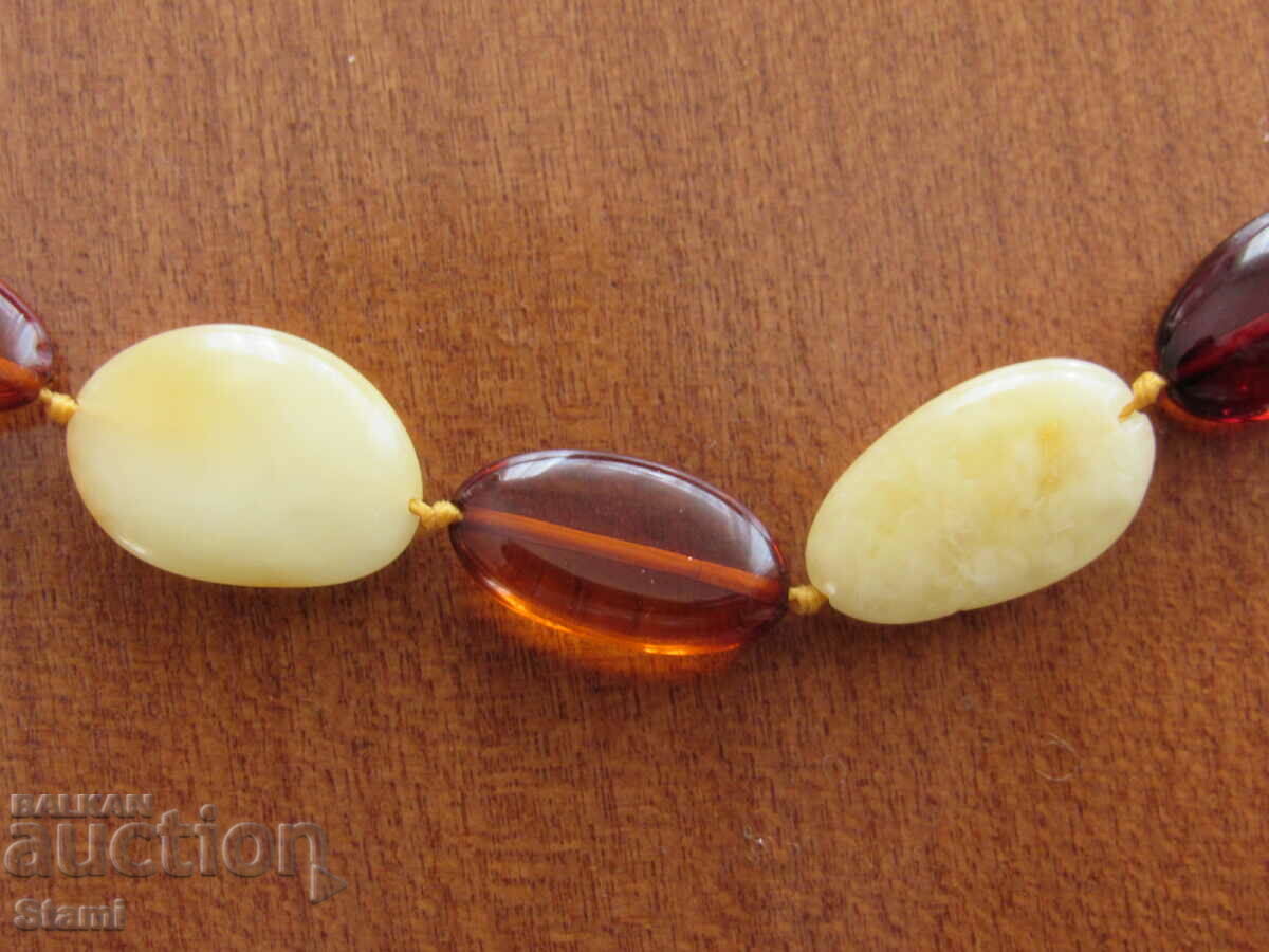 Delivery of Women's circle necklace made of premium Baltic amber