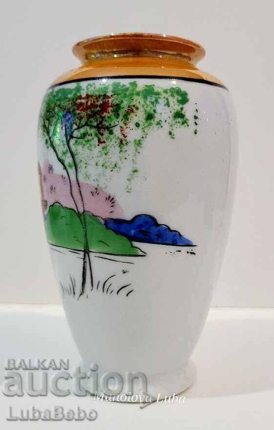 Auction  Japanese hand painted porcelain vase.
