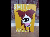 Semn de metal câinele Zâmbetul este un zâmbet contagios râde distractiv