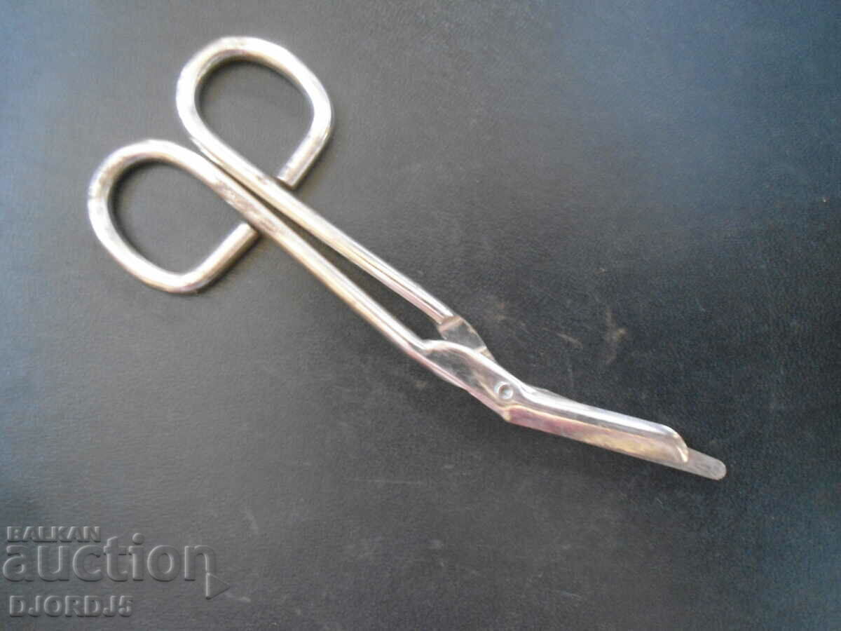 Old scissors, marked