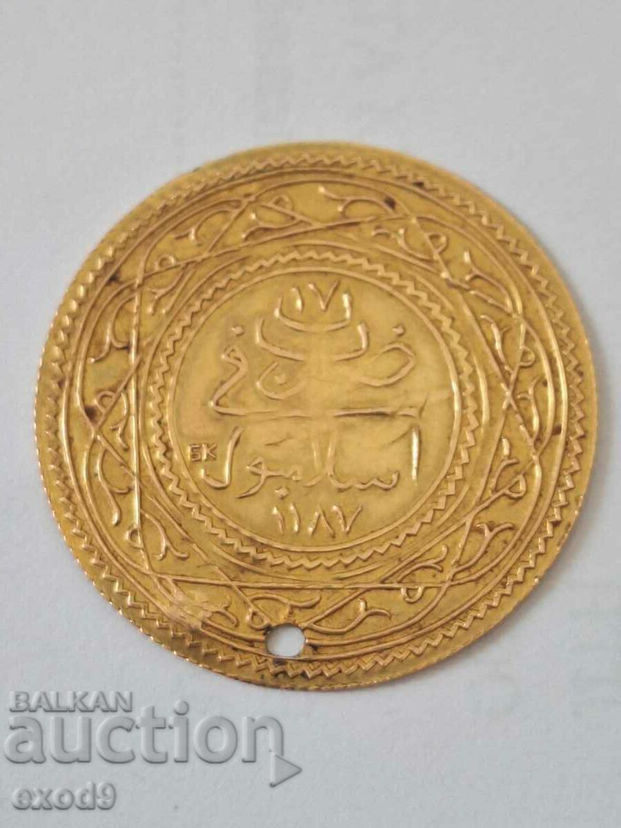 A rare gold coin, the pendara