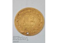 A rare gold coin, the pendara