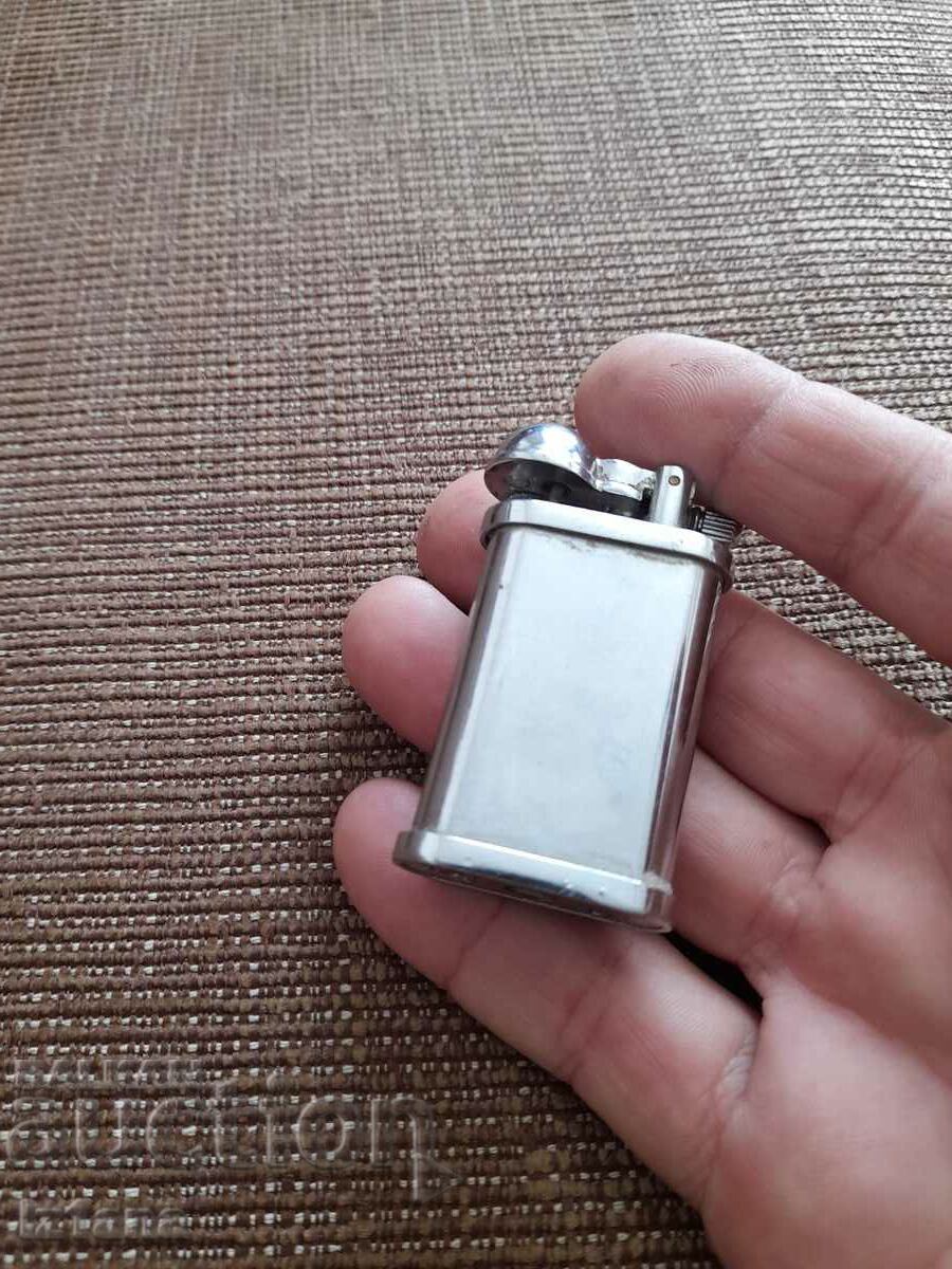 Auction  An old lighter