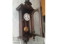 Vintage clock. Heirloom from the 19th century. Mechanical. Winding