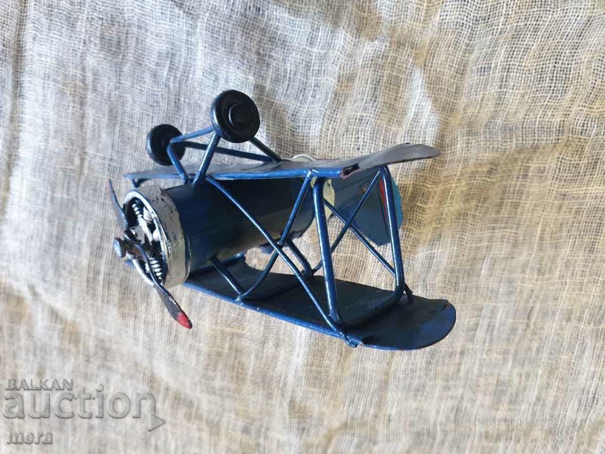 Delivery of Old metal propeller plane toy Delivery of Old metal propeller plane toy