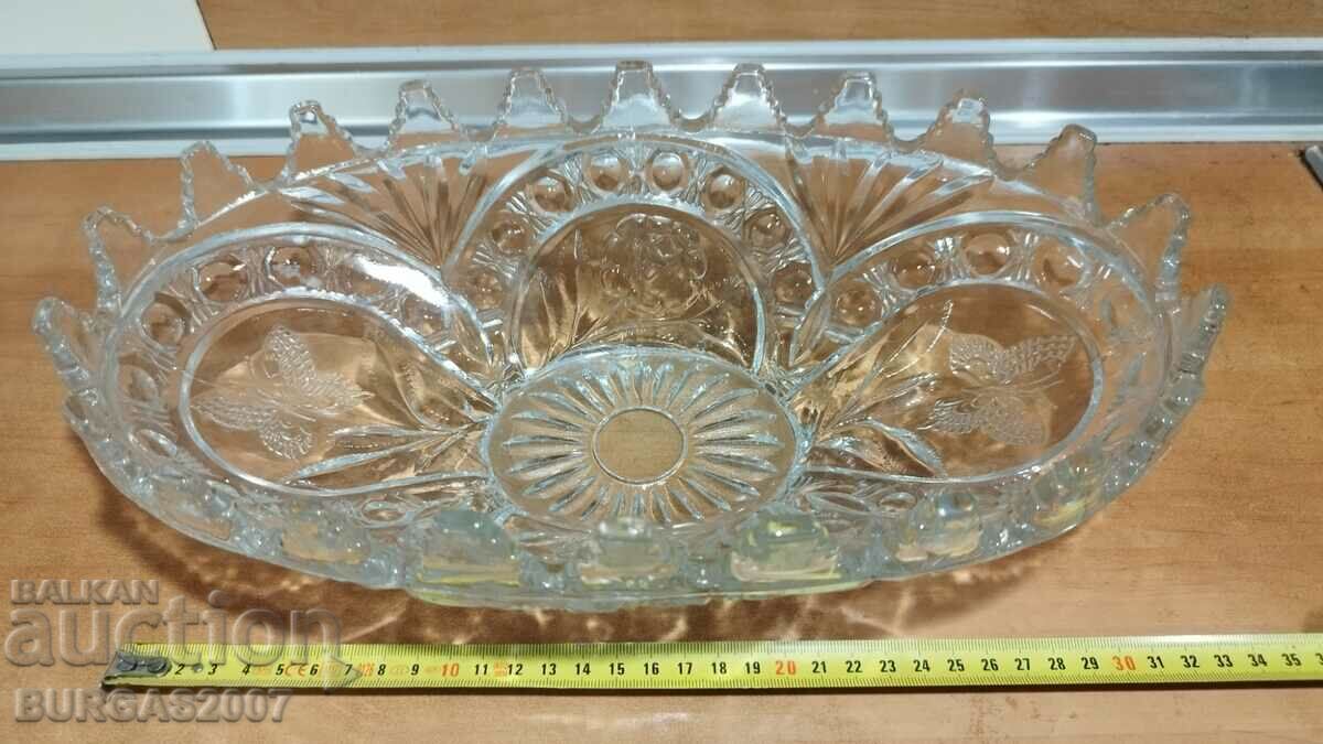 Old glass fruit bowl with butterflies