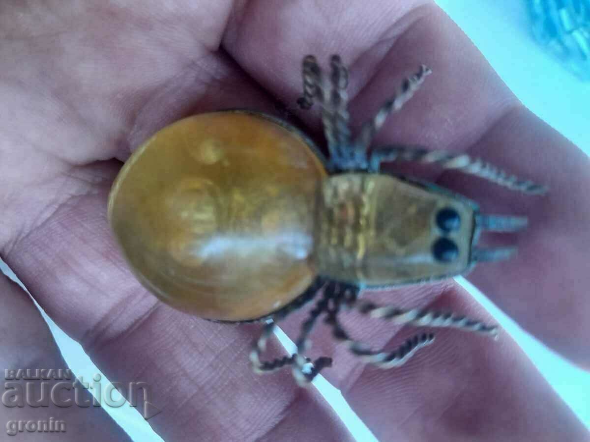 Royal brooch amber, spider, bronze, gilding marked with price 60.00 BGN | € 30.68