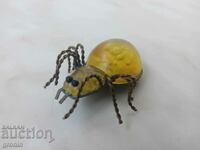 Royal brooch amber, spider, bronze, gilding marked