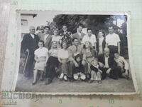 Photo of relatives in front of a building