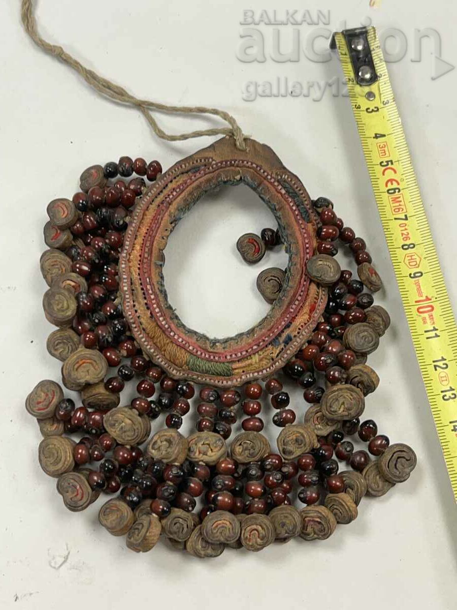 Tibetan pendant flickers