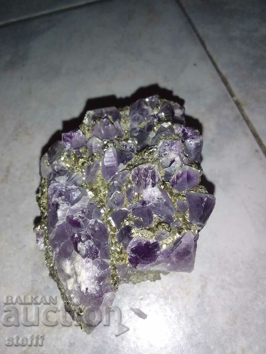 Purple amethyst with pyrrhotite