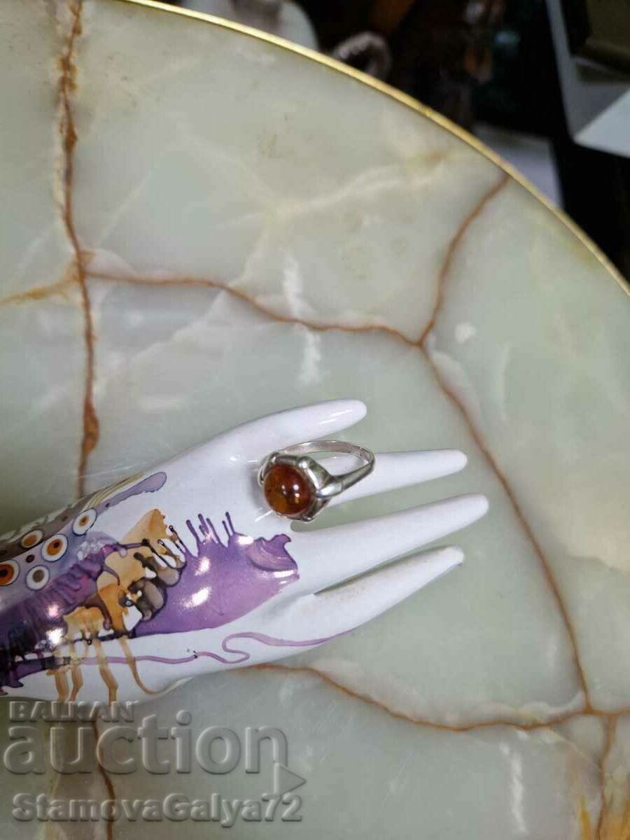 Auction A great antique silver ring with amber Auction A great antique silver ring with amber