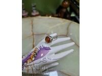 A great antique silver ring with amber