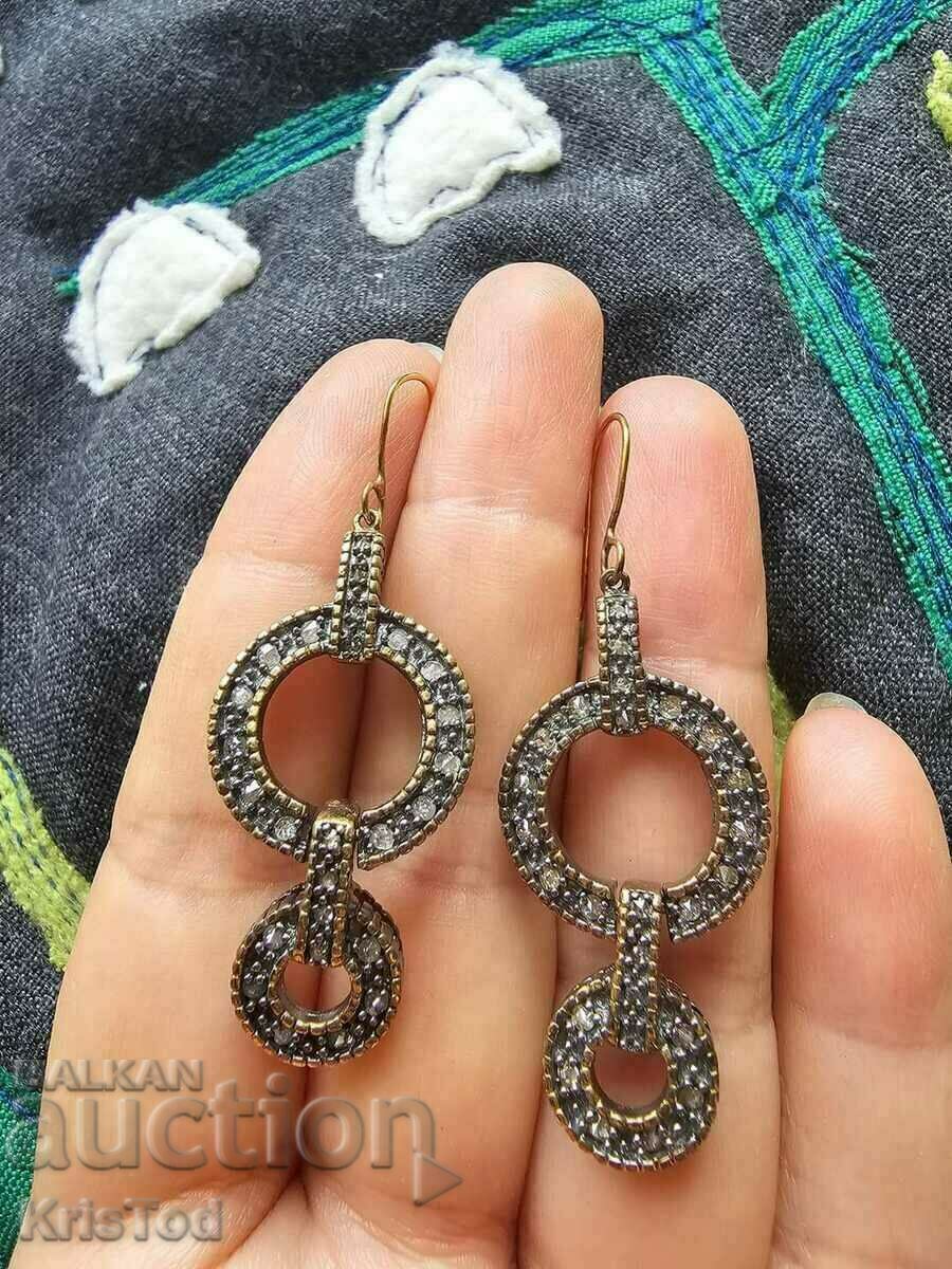 Beautiful earrings with Diamonds in gold and silver