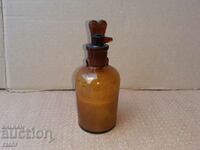 Old apothecary bottle with dropper. Pharmacy glassware