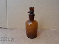 Old apothecary bottle with dropper. Pharmacy glassware