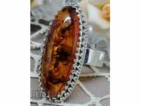 Beautiful silver ring with amber