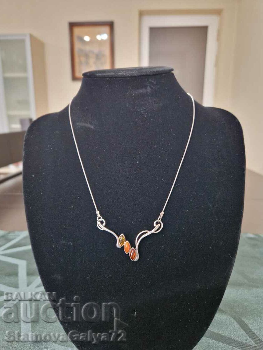 A lovely antique silver amber necklace