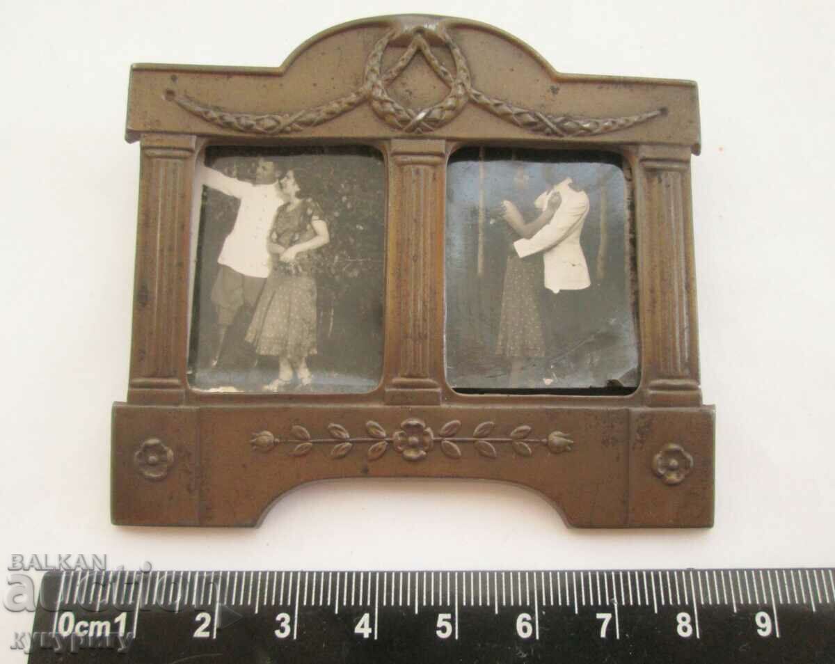 Old small metal double photo frame with ornaments with price 30.00 BGN | € 15.34 Old small metal double photo frame with ornaments with price 30.00 BGN | € 15.34