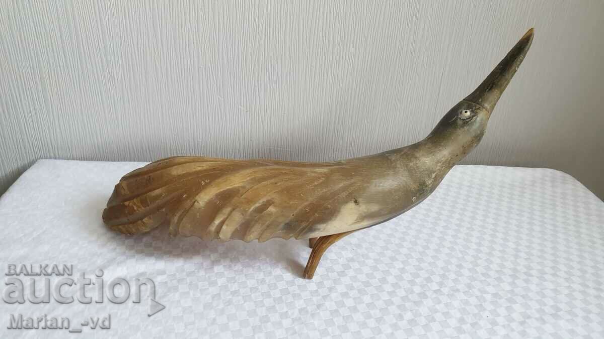 Auction Old figure of a bird made of horn Auction Old figure of a bird made of horn