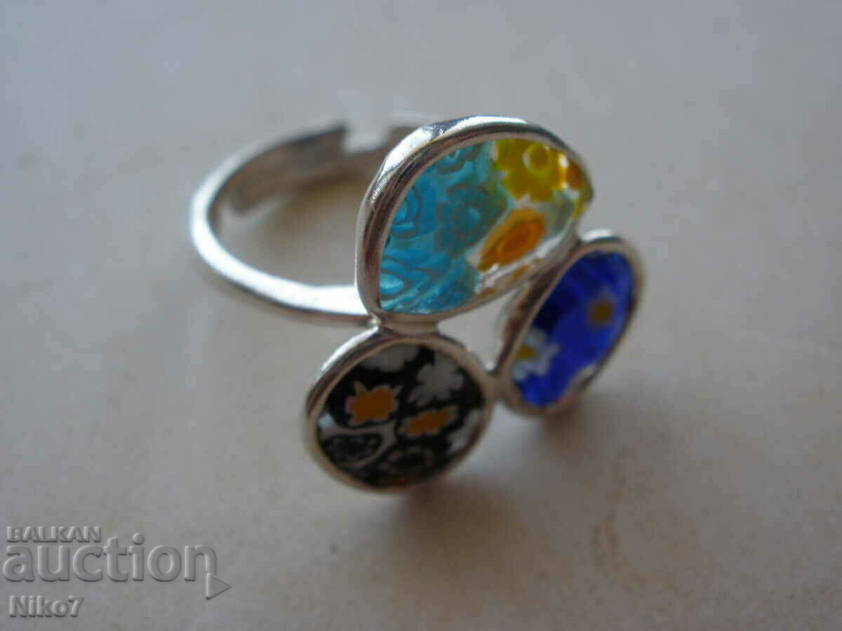Delivery of Vintage silver Venetian Murano glass ring.