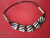 Necklace made of bone, African giraffe, batik, beads