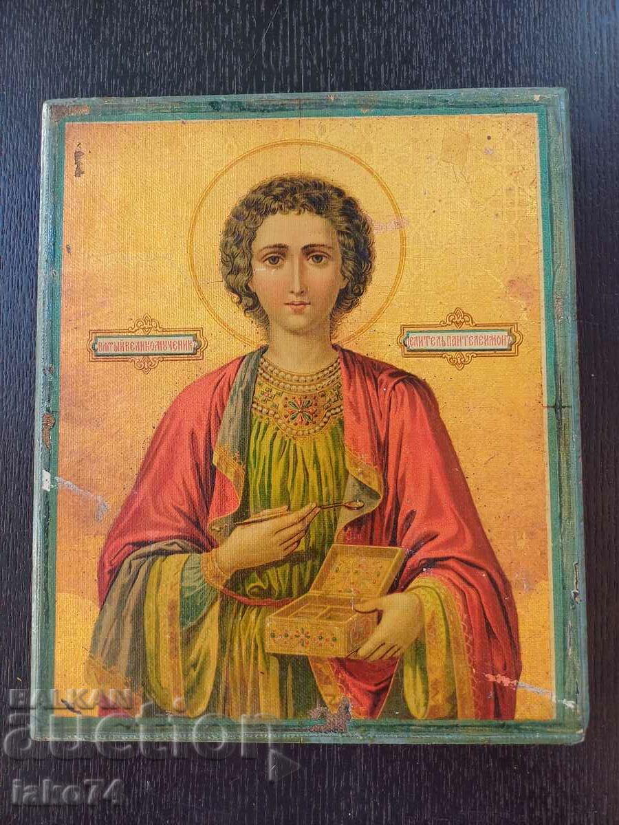 Old icon of Saint Panteleimon lithograph on fabric 19cm/16cm.