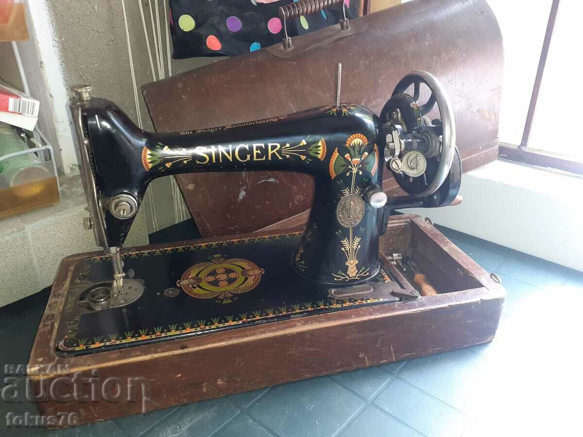 Old and very beautiful Singer sewing machine - antique