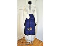 Authentic northern folk costume. Pischimal, shirt and apron