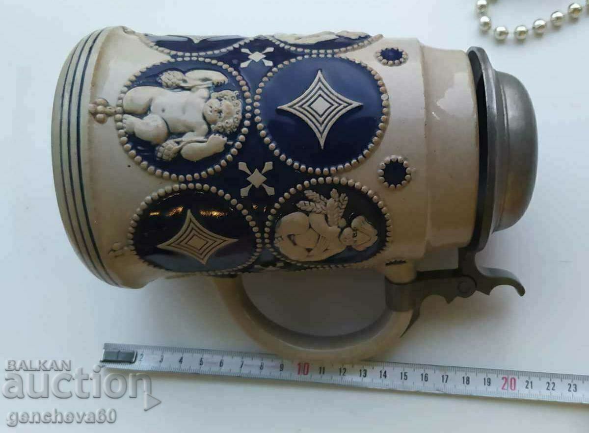 Auction  Collectible beer mug with initials, markings