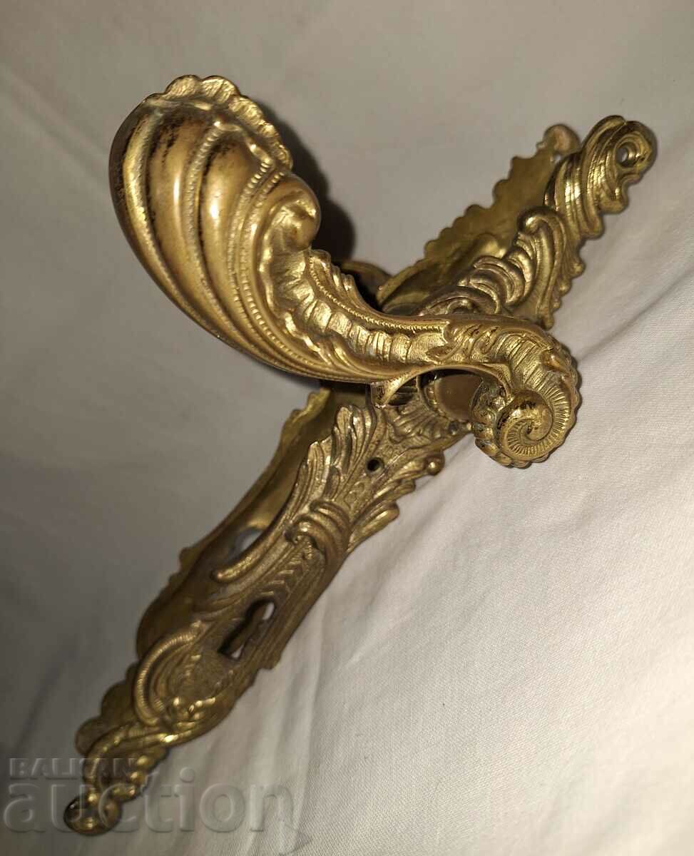 Old bronze baroque doorknobs