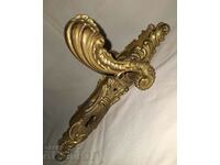 Old bronze baroque doorknobs