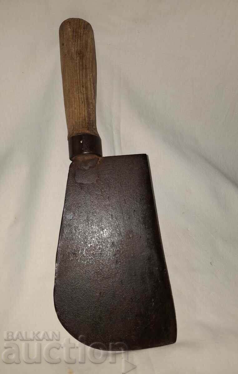 An old forged wide saber An old forged wide saber