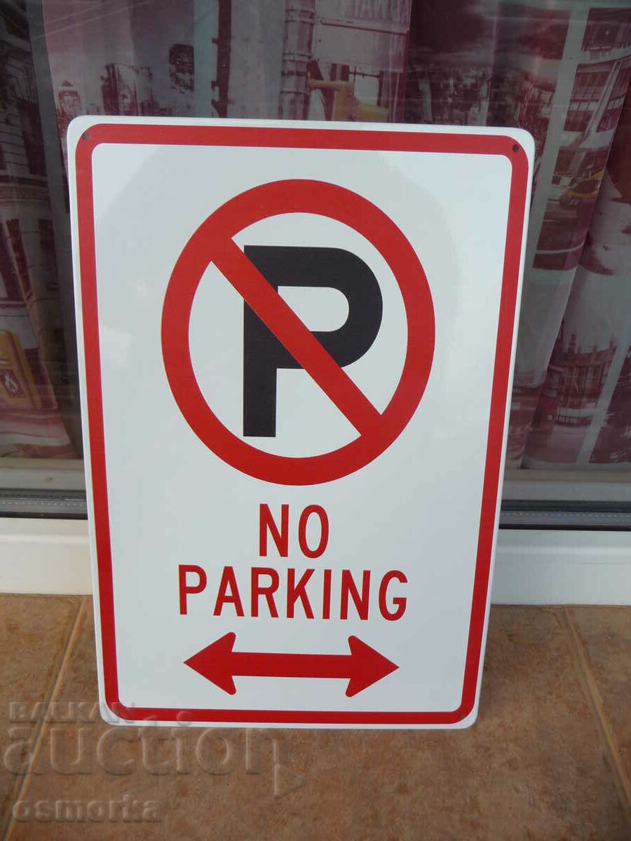 Metal sign inscription Prohibited parking cars people