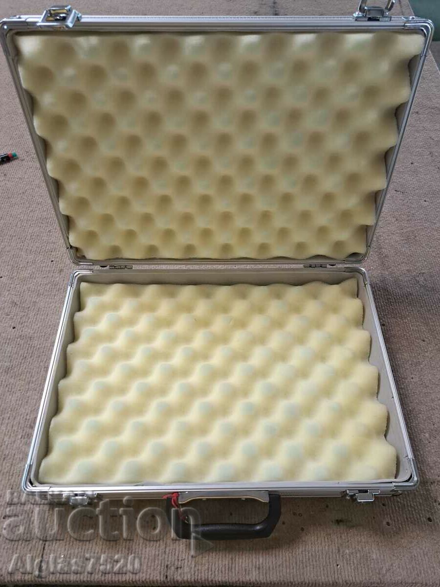 A small aluminum briefcase