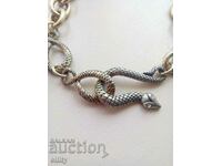 Women's necklace with snake clasp