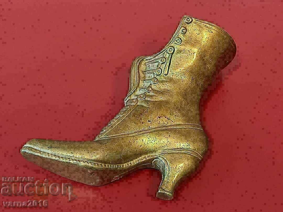 Auction  Vintage solid brass boot
